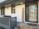 Inviting front porch with seating and a welcoming entrance with unique decor and a welcome sign at 170 Dillard Ne Dr, Kennesaw, GA 30144