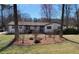 Well-maintained ranch-style home featuring a nicely landscaped front yard and a lush green lawn at 170 Dillard Ne Dr, Kennesaw, GA 30144