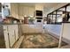 Spacious kitchen featuring vintage appliances and an open view of the connected dining area at 170 Dillard Ne Dr, Kennesaw, GA 30144