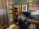 This home office has custom paint, shelving, and natural lighting at 170 Dillard Ne Dr, Kennesaw, GA 30144