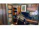 This home office has custom paint, shelving, and natural lighting at 170 Dillard Ne Dr, Kennesaw, GA 30144