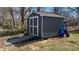 Well-maintained shed with a ramp for easy access, providing ample storage space for outdoor equipment at 170 Dillard Ne Dr, Kennesaw, GA 30144
