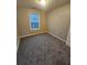 Cozy bedroom with a bright window and soft carpet at 2612 Halligan Pointe, Riverdale, GA 30296