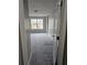 Bright bedroom features plush gray carpeting and a large window for ample natural light at 2612 Halligan Pointe, Riverdale, GA 30296