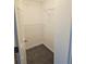 Walk-in closet featuring wire shelving and gray carpeting at 2612 Halligan Pointe, Riverdale, GA 30296