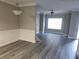 Inviting dining and living areas featuring modern flooring, paint, and trim details at 2612 Halligan Pointe, Riverdale, GA 30296