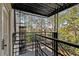 Private balcony offering a peaceful view of the surrounding trees and greenery at 30 Collier Nw Rd # 6, Atlanta, GA 30309