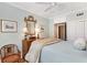Serene bedroom with a ceiling fan, classic furniture, and ample natural light at 30 Collier Nw Rd # 6, Atlanta, GA 30309