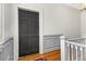 Apartment entryway featuring hardwood floors and wainscoting at 30 Collier Nw Rd # 6, Atlanta, GA 30309