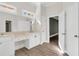 Bright bathroom featuring double vanity, white cabinets, and modern fixtures at 360 Wembley Cir, Atlanta, GA 30328