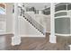 Welcoming foyer with staircase, beautiful floors, and natural light at 360 Wembley Cir, Atlanta, GA 30328