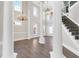 Bright foyer with staircase, columns and hardwood floors at 360 Wembley Cir, Atlanta, GA 30328