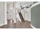 Grand foyer featuring staircase with iron railing, soaring ceilings, and hardwood floors at 360 Wembley Cir, Atlanta, GA 30328