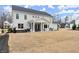 Large backyard area with patio, hot tub, and plenty of open space for activities at 2903 Eva Clb, Acworth, GA 30101