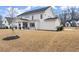 Wide backyard with large patio area, perfect for outdoor gatherings and entertaining at 2903 Eva Clb, Acworth, GA 30101