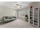 Comfortable bedroom with a daybed, fan, and natural light at 2903 Eva Clb, Acworth, GA 30101