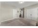 Spacious bedroom with neutral carpet and white doors offering ample closet space at 2903 Eva Clb, Acworth, GA 30101
