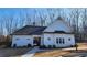 Exterior shot of the club house features charming architecture and a welcoming entrance at 2903 Eva Clb, Acworth, GA 30101