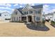 Brick home with covered front porch and well-maintained lawn exudes classic elegance at 2903 Eva Clb, Acworth, GA 30101