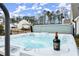 Inviting hot tub with clean, clear water for relaxation, surrounded by a serene backyard at 2903 Eva Clb, Acworth, GA 30101