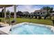 Inviting hot tub with scenic backyard views and manicured landscaping, offering a tranquil escape at 2903 Eva Clb, Acworth, GA 30101