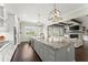 Open concept kitchen with granite island, stainless appliances and eat in area at 2903 Eva Clb, Acworth, GA 30101