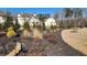 Mulched landscaping with ornamental grasses and trees adds beauty to the property's exterior at 2903 Eva Clb, Acworth, GA 30101