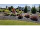 Beautifully landscaped yard featuring colorful bushes and small trees, adding charm to the property at 2903 Eva Clb, Acworth, GA 30101