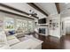 Cozy living room with fireplace, built-ins and beamed ceilings at 2903 Eva Clb, Acworth, GA 30101