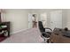 Comfortable office space featuring an executive chair and view into the ensuite bath at 2903 Eva Clb, Acworth, GA 30101