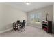 Bright office space with neutral carpet, a large window, and a desk with workspace at 2903 Eva Clb, Acworth, GA 30101