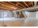 Large unfinished basement offers potential for customization and added living space at 3344 Creekwood Dr, Rex, GA 30273