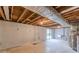 Unfinished basement with concrete floor and walls offers great potential for customization at 3344 Creekwood Dr, Rex, GA 30273