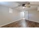 Finished bedroom with a ceiling fan features contemporary colors and flooring at 3344 Creekwood Dr, Rex, GA 30273