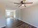 Bedroom with closet, wood-look floors, neutral walls, and a window providing natural light at 3344 Creekwood Dr, Rex, GA 30273