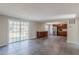 Spacious living room features an open concept design to the kitchen and sliding doors leading outdoors at 3344 Creekwood Dr, Rex, GA 30273
