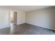 Neutral-toned living room with tile floor offers versatile space at 3344 Creekwood Dr, Rex, GA 30273