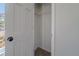 Small walk-in closet with white walls and a wire shelf at 3777 Clubhouse Way, Conyers, GA 30094