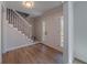 Inviting entryway with a staircase and natural light at 3777 Clubhouse Way, Conyers, GA 30094