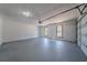 Spacious garage with updated windows, lighting and concrete floor at 3777 Clubhouse Way, Conyers, GA 30094