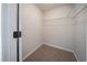 Walk-in closet with carpeted floor and wire shelving at 3777 Clubhouse Way, Conyers, GA 30094