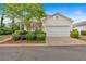 Charming single-story home with a two-car garage at 627 W Oaks Dr, Woodstock, GA 30188