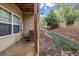 View of the backyard featuring a stepping stone path, AC unit and siding on the house at 1992 Cobblestone Ne Cir, Brookhaven, GA 30319