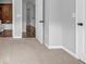 Bedroom featuring neutral walls and plush carpet, as well as a view into the hallway at 1992 Cobblestone Ne Cir, Brookhaven, GA 30319