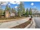 Community entrance with brick sign reading 'Cobblestone At Brookhaven' and manicured landscaping at 1992 Cobblestone Ne Cir, Brookhaven, GA 30319