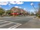 Brick building exterior with street view featuring architectural details, businesses, and surrounding landscaping at 1992 Cobblestone Ne Cir, Brookhaven, GA 30319