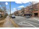 Commercial building street view highlighting street parking, sidewalks, and restaurants with outdoor seating at 1992 Cobblestone Ne Cir, Brookhaven, GA 30319