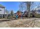 Fenced backyard featuring a play set and green grass at 3202 Monarch Pine Dr, Peachtree Corners, GA 30071