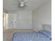 Bedroom with a ceiling fan, window for natural light, and neutral carpet at 3202 Monarch Pine Dr, Peachtree Corners, GA 30071