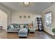 Cozy living room featuring hardwood floors, neutral tones, and natural light, creating a relaxing atmosphere at 3202 Monarch Pine Dr, Peachtree Corners, GA 30071